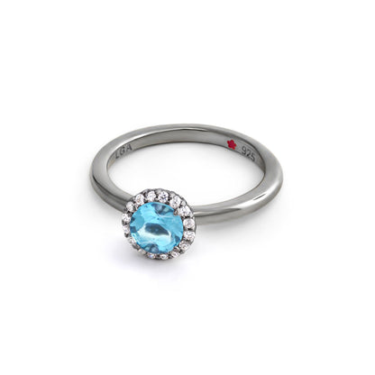 Layers of Love ring with blue gemstone and pavé halo in 925 silver on Tampa Home & Garden Store
