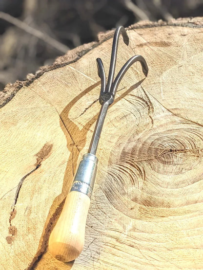 3-tine hand-forged cultivator with wooden handle from Homestead Iron, lifetime guarantee on Tampa Home & Garden Store