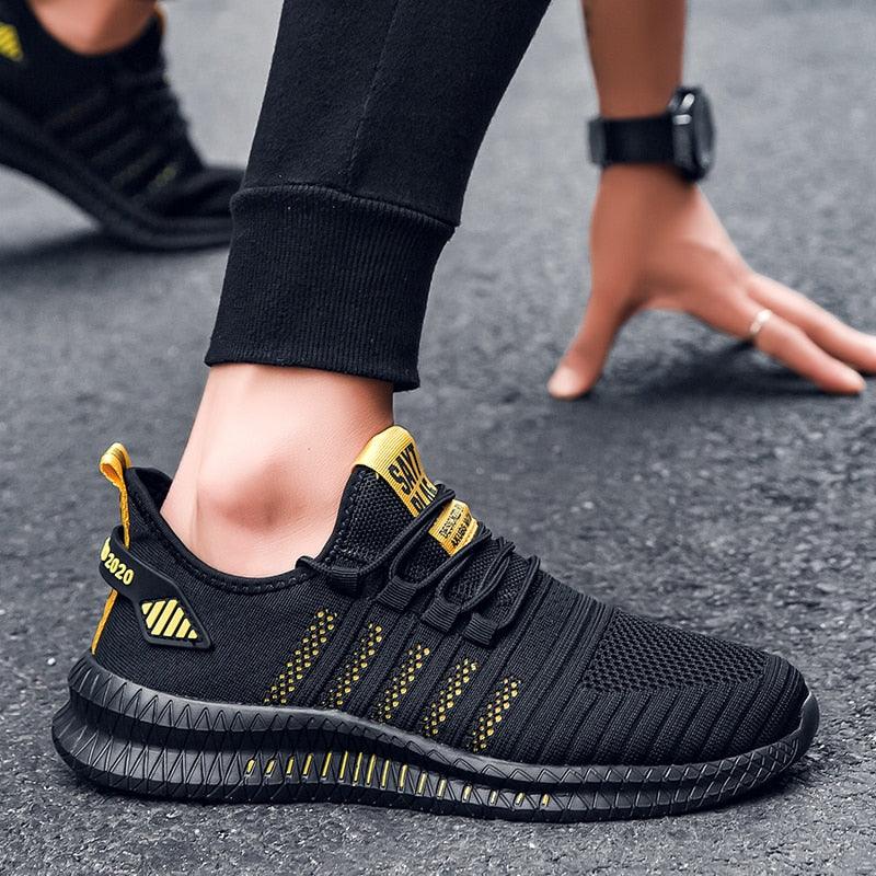 Stevvex men's athletic sneakers black with yellow accents, breathable knit upper on Tampa Home & Garden Store