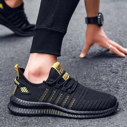 Stevvex men's athletic sneakers black with yellow accents, breathable knit upper on Tampa Home & Garden Store