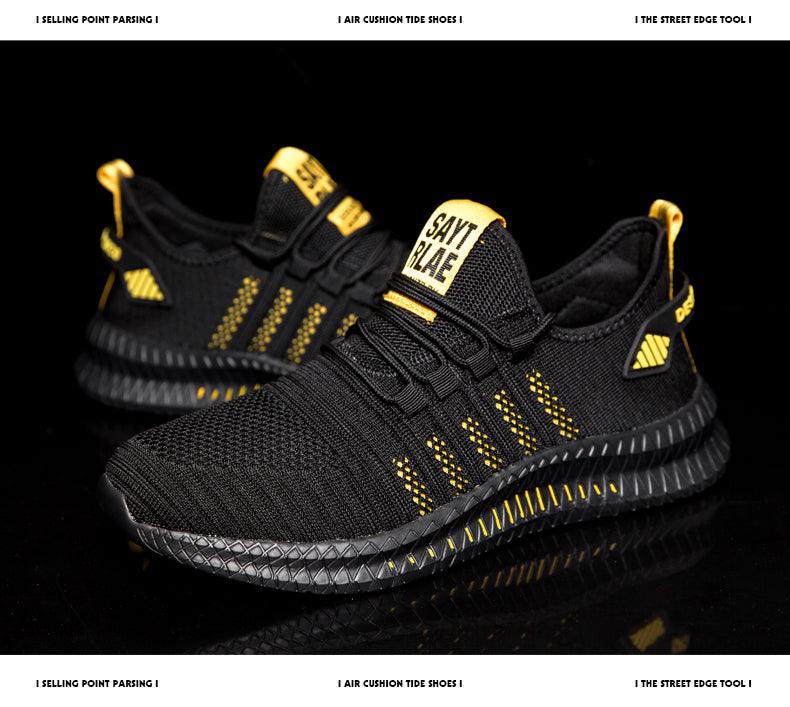 Stevvex men's athletic sneakers, black with yellow accents, lightweight non-slip sole pair on Tampa Home & Garden Store