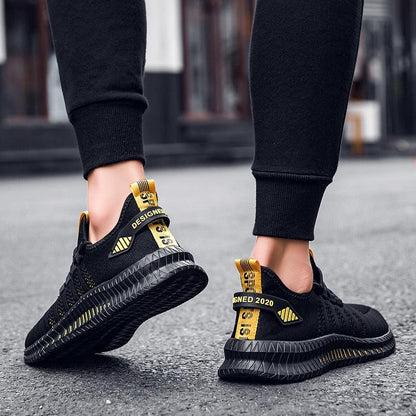 Stevvex pair of breathable men's athletic sneakers with black upper yellow pull tabs non-slip sole on Tampa Home & Garden Store