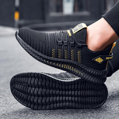 Pair of running lightweight men's sport sneakers Stevvex black knit upper grip sole on Tampa Home & Garden Store