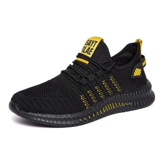 Stevvex running sneakers black knit upper with yellow accents and pull tab non-slip sole on Tampa Home & Garden Store