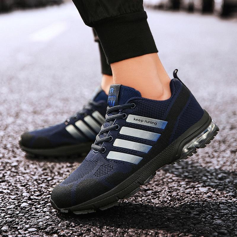Stevvex navy running sneakers lace-up with air cushion sole stripes on pavement on Tampa Home & Garden Store