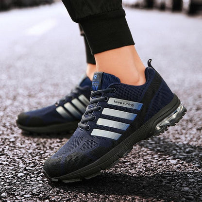 Stevvex navy running sneakers lace-up with air cushion sole stripes on pavement on Tampa Home & Garden Store
