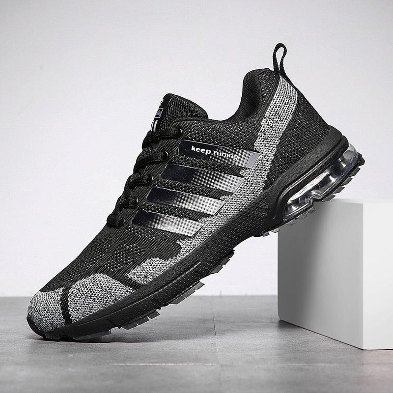 Stevvex running sneakers black knit upper with gray side stripes and air cushion sole on Tampa Home & Garden Store