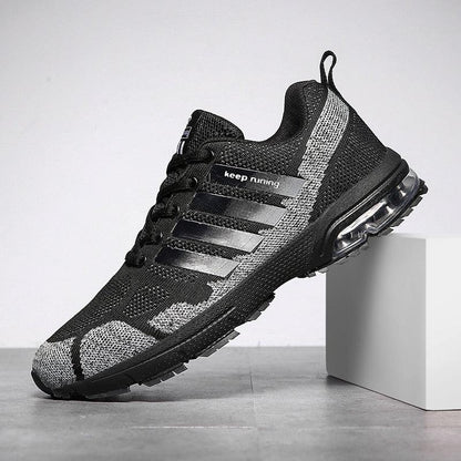 Stevvex running sneakers black knit upper with gray side stripes and air cushion sole on Tampa Home & Garden Store