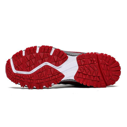 Stevvex men's running sneakers outsole with red traction tread and white midsole on Tampa Home & Garden Store