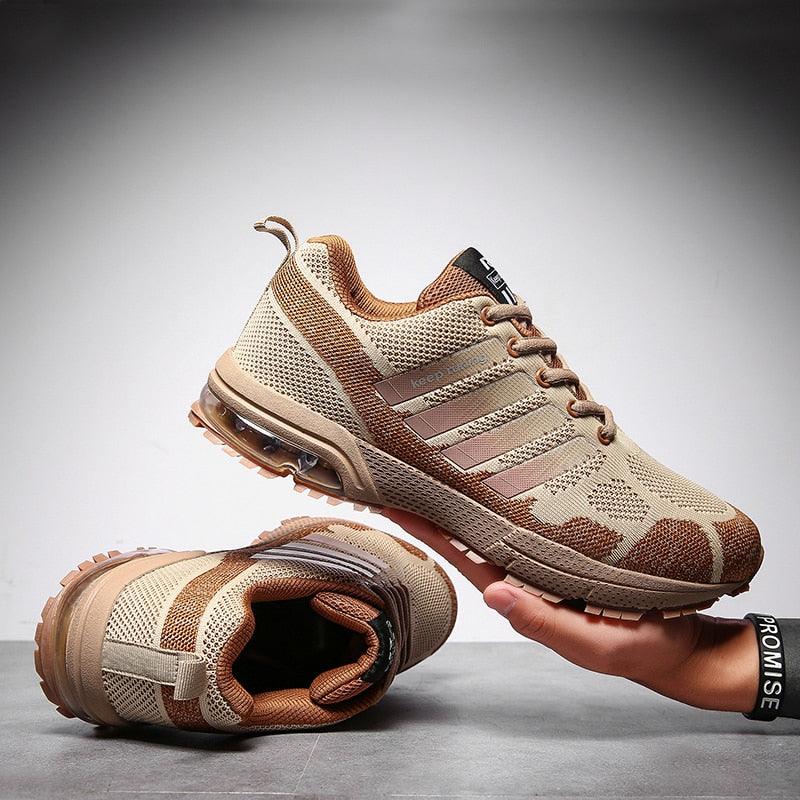 Pair of Stevvex running sneakers with tan mesh upper and visible air cushion sole on Tampa Home & Garden Store