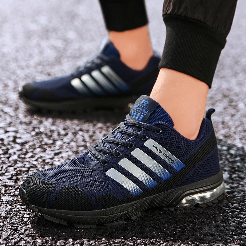 Stevvex navy running sneakers with breathable mesh, white stripes, and air cushion sole on Tampa Home & Garden Store