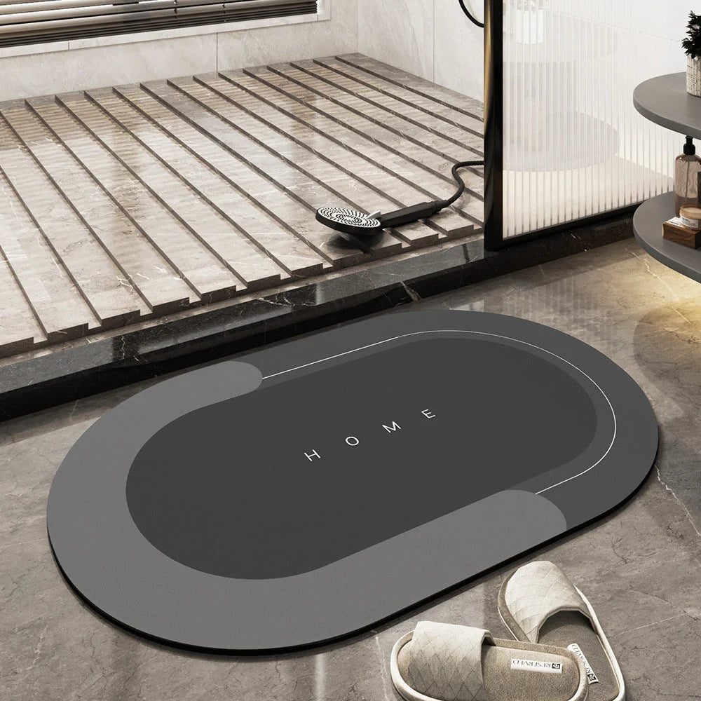 Non-Slip Quick Dry Bath Mat dark gray oval with Moktan Sabai branding on Tampa Home & Garden Store