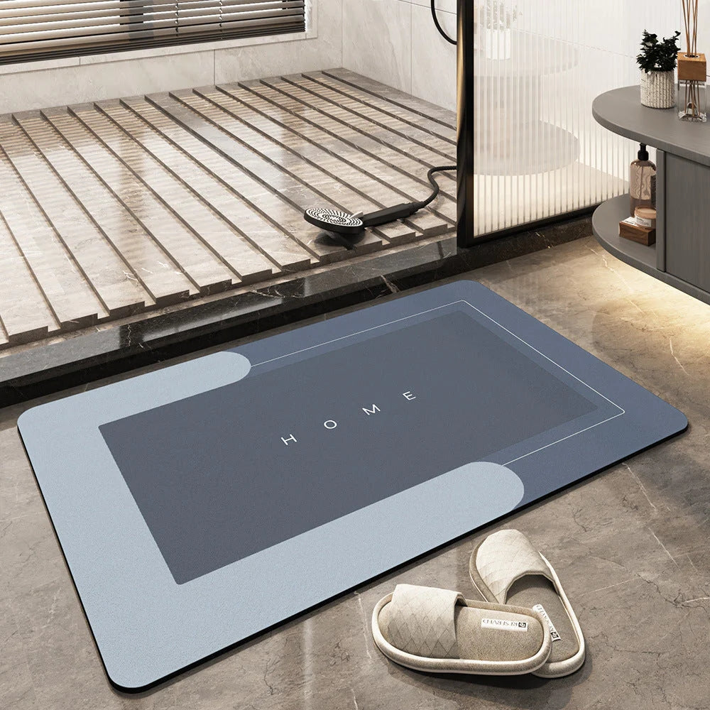 Non-Slip Quick Dry Bath Mat Moktan Sabai blue-gray with HOME graphic in modern bathroom on Tampa Home & Garden Store