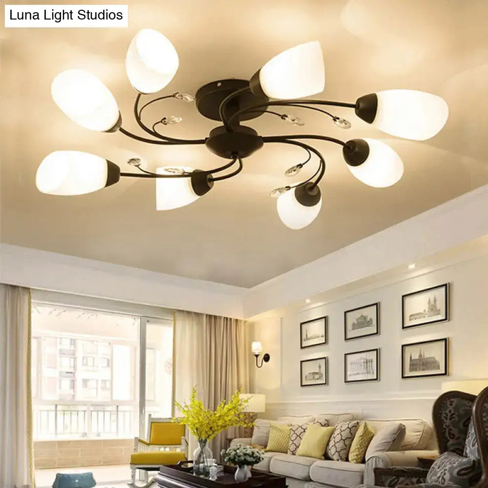 Black Opal Glass Flush Light with eight frosted glass shades on black metal arms on Tampa Home & Garden Store