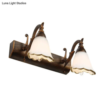 White glass vanity light fixture with two frosted bell shades in bronze finish by Decorbites on Tampa Home & Garden Store