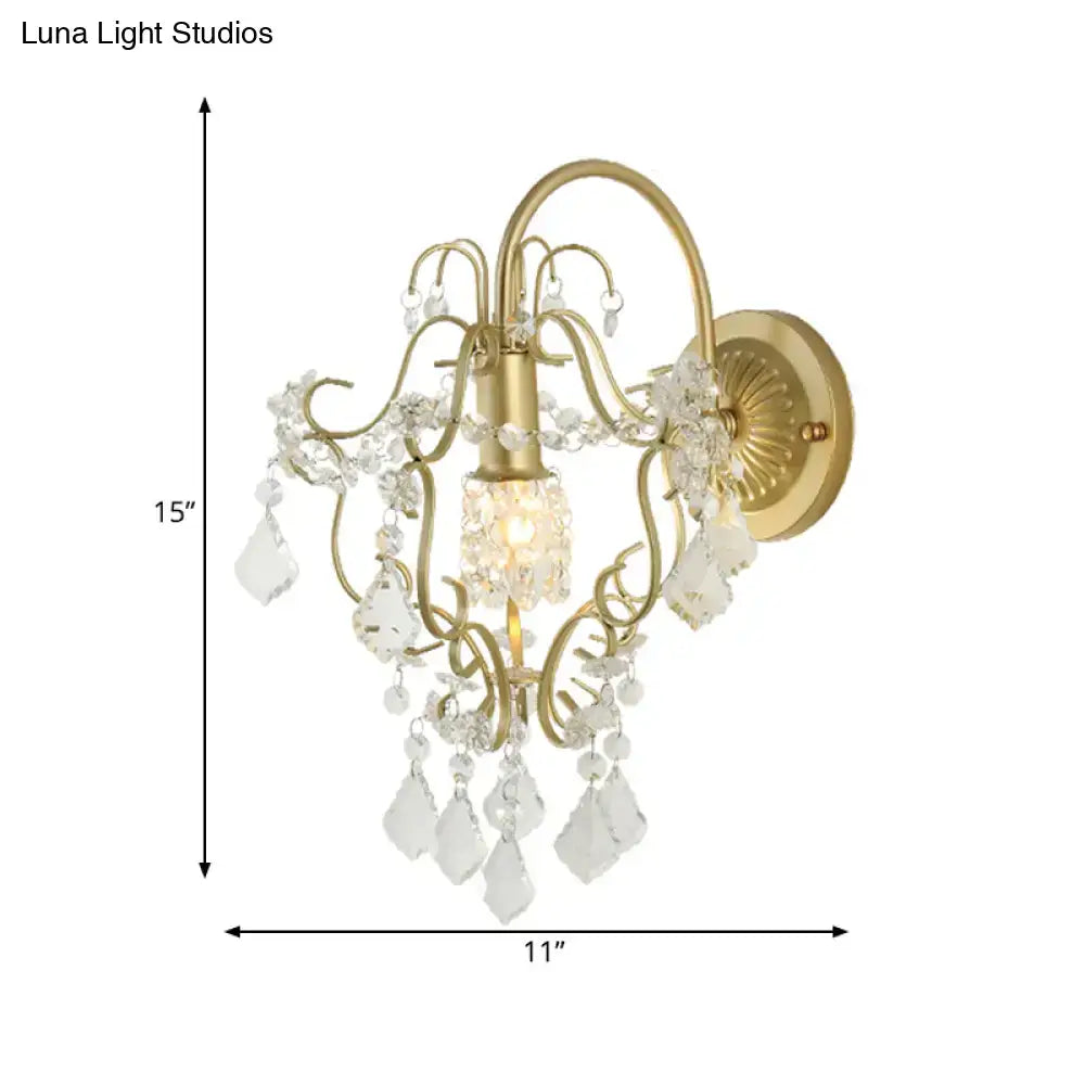 Gold Crystal Bent Arm Sconce by Decorbites, gold finish wall sconce with hanging crystal prisms on Tampa Home & Garden Store