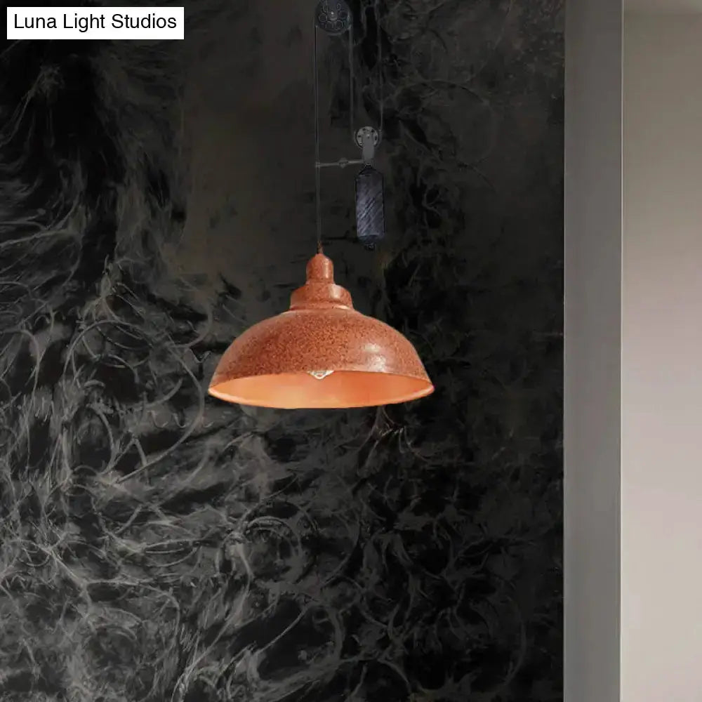 Rustic industrial copper dome pendant with pulley, hanging from a cord in a dark marbled backdrop on Tampa Home & Garden Store