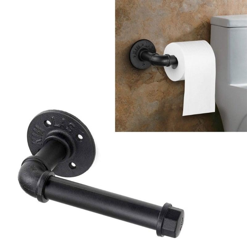 Stevvex rustic industrial pipe toilet paper holder in black iron wall mounted with flange on Tampa Home & Garden Store