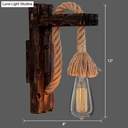 Rustic red wooden wall sconce with thick rope and tassel, Edison bulb farmhouse lighting on Tampa Home & Garden Store