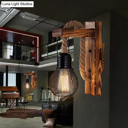 Rustic red wooden wall light with rope and industrial mesh shade farmhouse sconce on Tampa Home & Garden Store