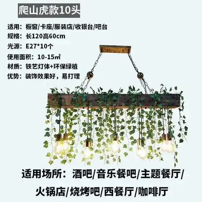 Rustic wood hanging chandelier planter by Decorbites with five Edison bulbs and ivy on Tampa Home & Garden Store