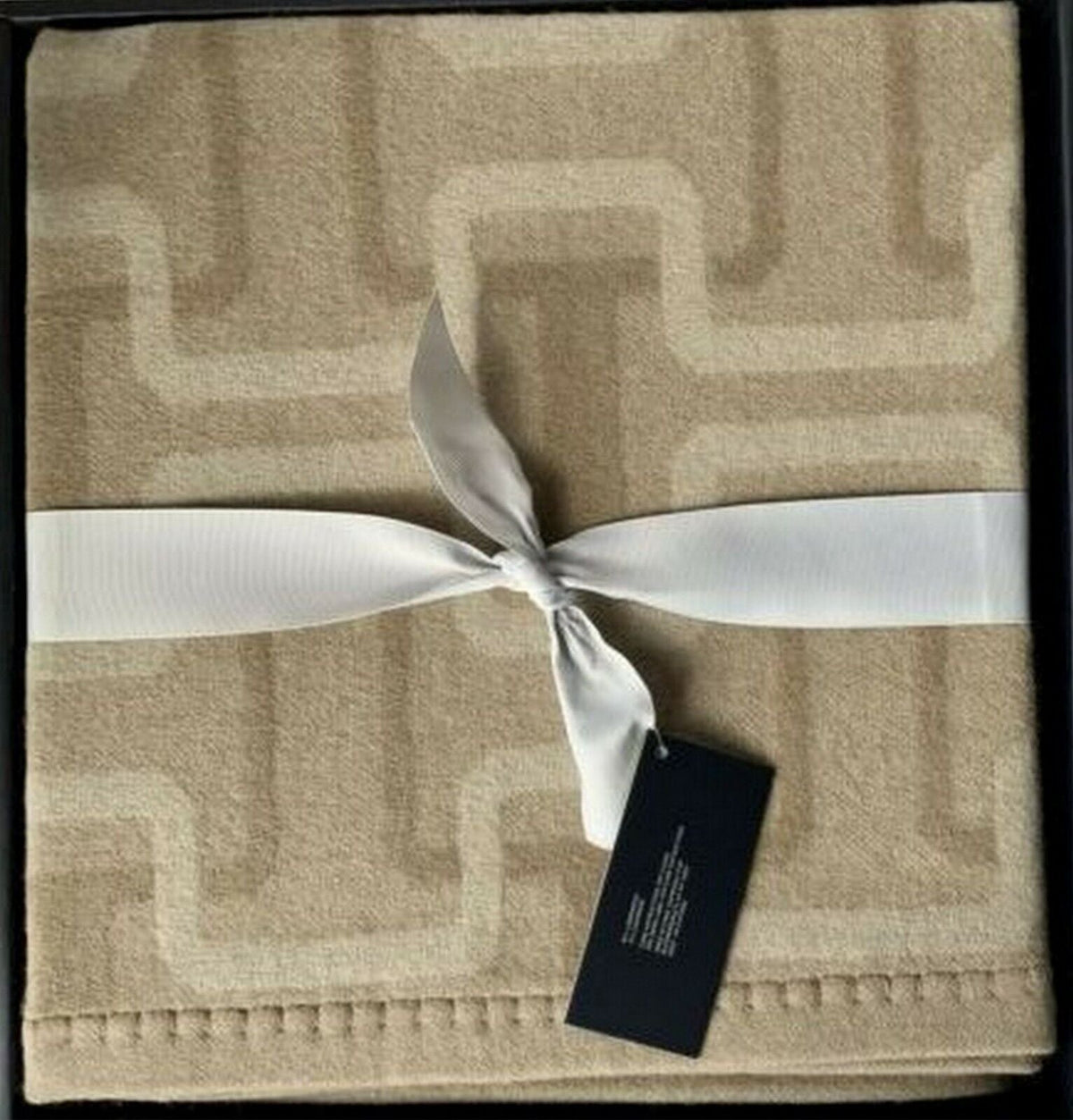 Hudson Park Lambswool/Cashmere Throw beige with white satin ribbon on Tampa Home & Garden Store