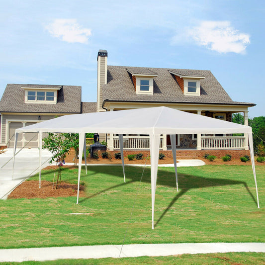 10x30 ft white gazebo canopy tent with stakes and wind ropes in front of a house on Tampa Home & Garden Store