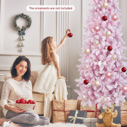 7 ft DirectDeals pink snow-flocked hinged pencil tree with 300 lights, 8 modes; girl decorating on Tampa Home & Garden Store