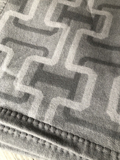 Hudson Park Collection lambswool/cashmere jacquard throw in grey with stitched border on Tampa Home & Garden Store