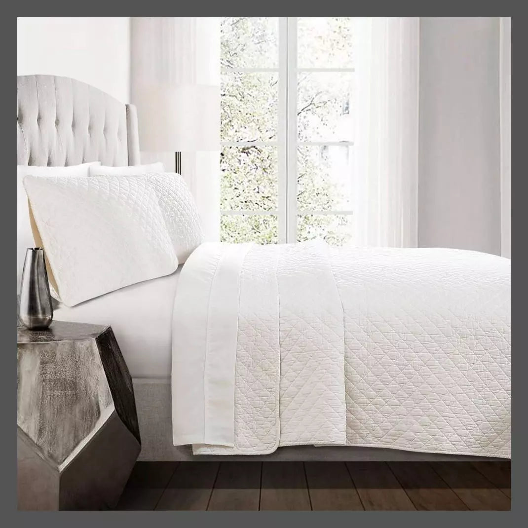 Lush Decor Ava Diamond oversized cotton 3-piece quilt set Full/Queen with white shams on bed on Tampa Home & Garden Store