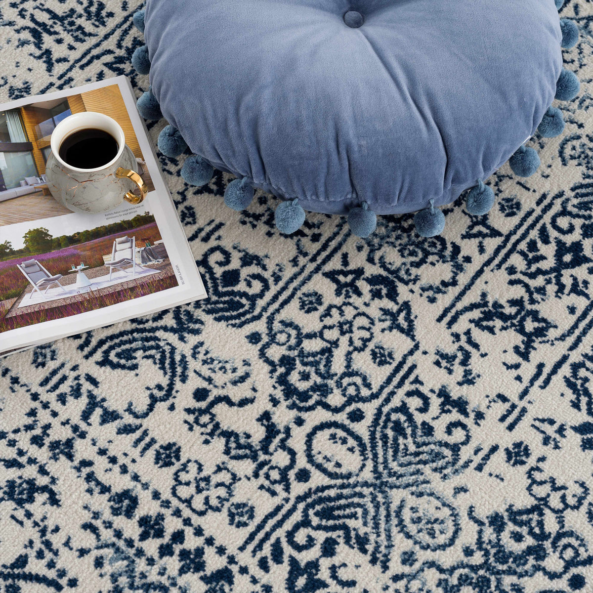 Michie Blue Area Rug by Boutique Rugs, navy ivory geometric pattern, plush tufted texture on Tampa Home & Garden Store