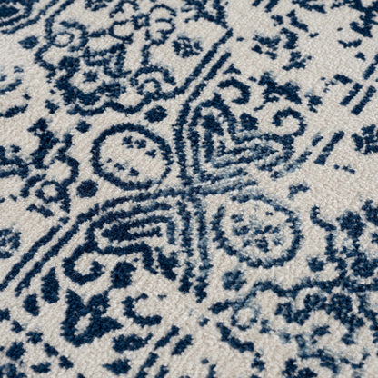Michie Blue Area Rug by Boutique Rugs with blue ivory ornate pattern on Tampa Home & Garden Store