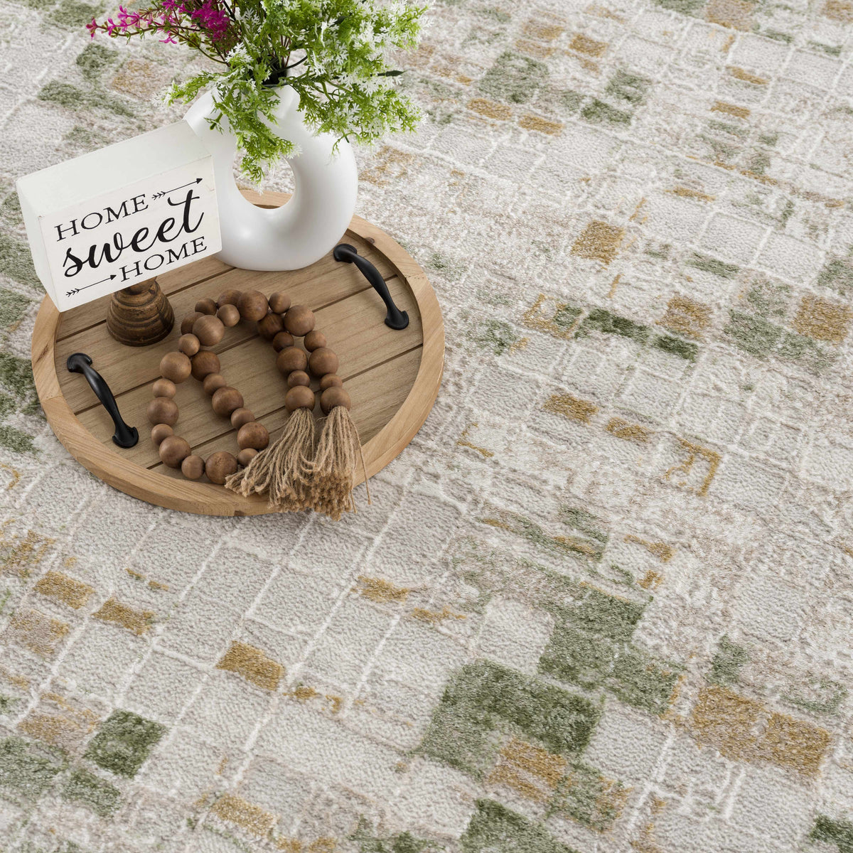 Liveri Green Mosaic Rug by Boutique Rugs beige-green mosaic pattern with tray display on Tampa Home & Garden Store