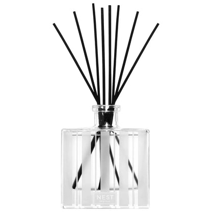 Nest New York Rose Noir & Oud Reed Diffuser in a clear glass bottle with black reeds on Tampa Home & Garden Store