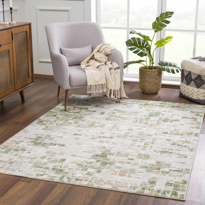 Liveri Green Mosaic Rug with green and cream mosaic pattern in a cozy living room on Tampa Home & Garden Store