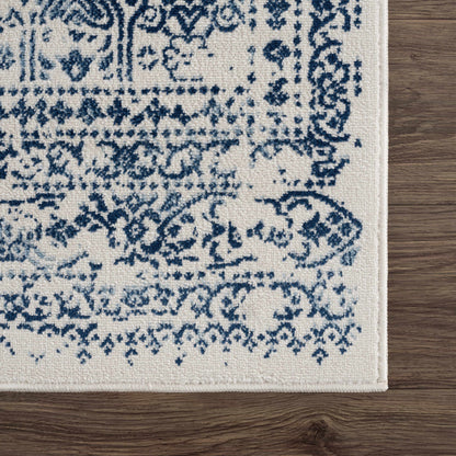 Michie Blue Area Rug by Boutique Rugs, blue motif on ivory background on Tampa Home & Garden Store