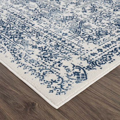 Michie Blue Area Rug by Boutique Rugs in blue and ivory Persian-inspired pattern on Tampa Home & Garden Store