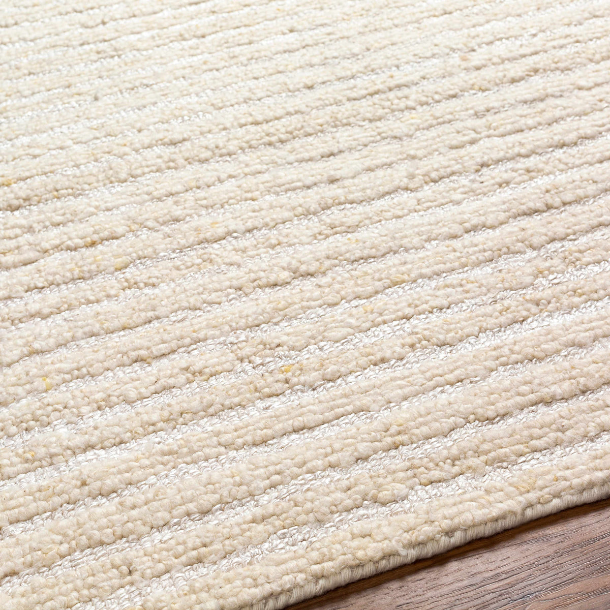 Debra Area Rug by Boutique Rugs, cream boucle texture closeup on beige rug on Tampa Home & Garden Store