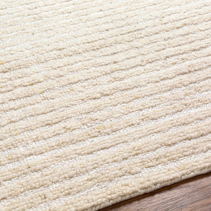 Debra Area Rug by Boutique Rugs, cream boucle texture closeup on beige rug on Tampa Home & Garden Store