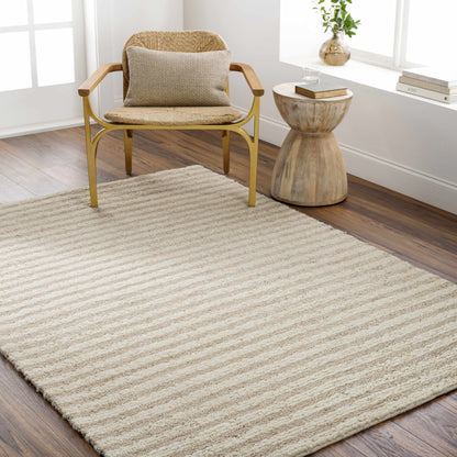 Saku Cream Striped Wool Rug by Boutique Rugs, cream wool with subtle stripes on hardwood floor on Tampa Home & Garden Store