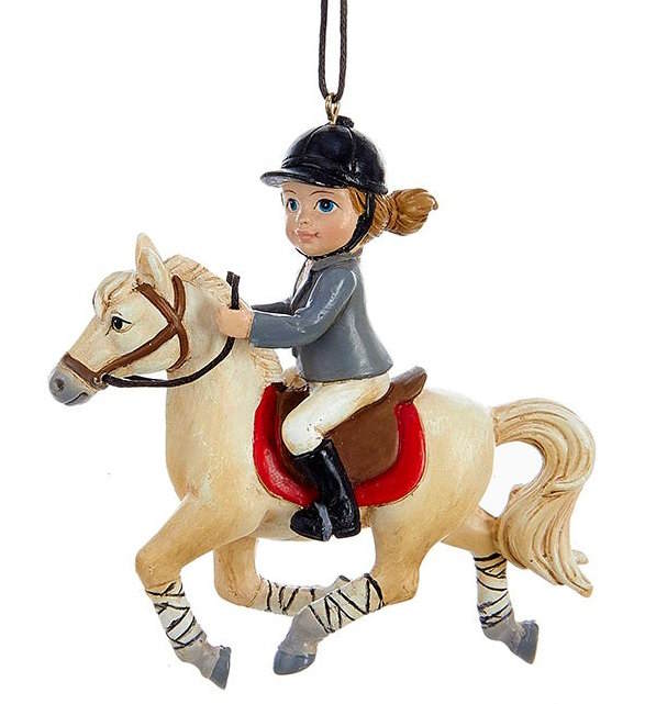 Adorno de niña montando a caballo -