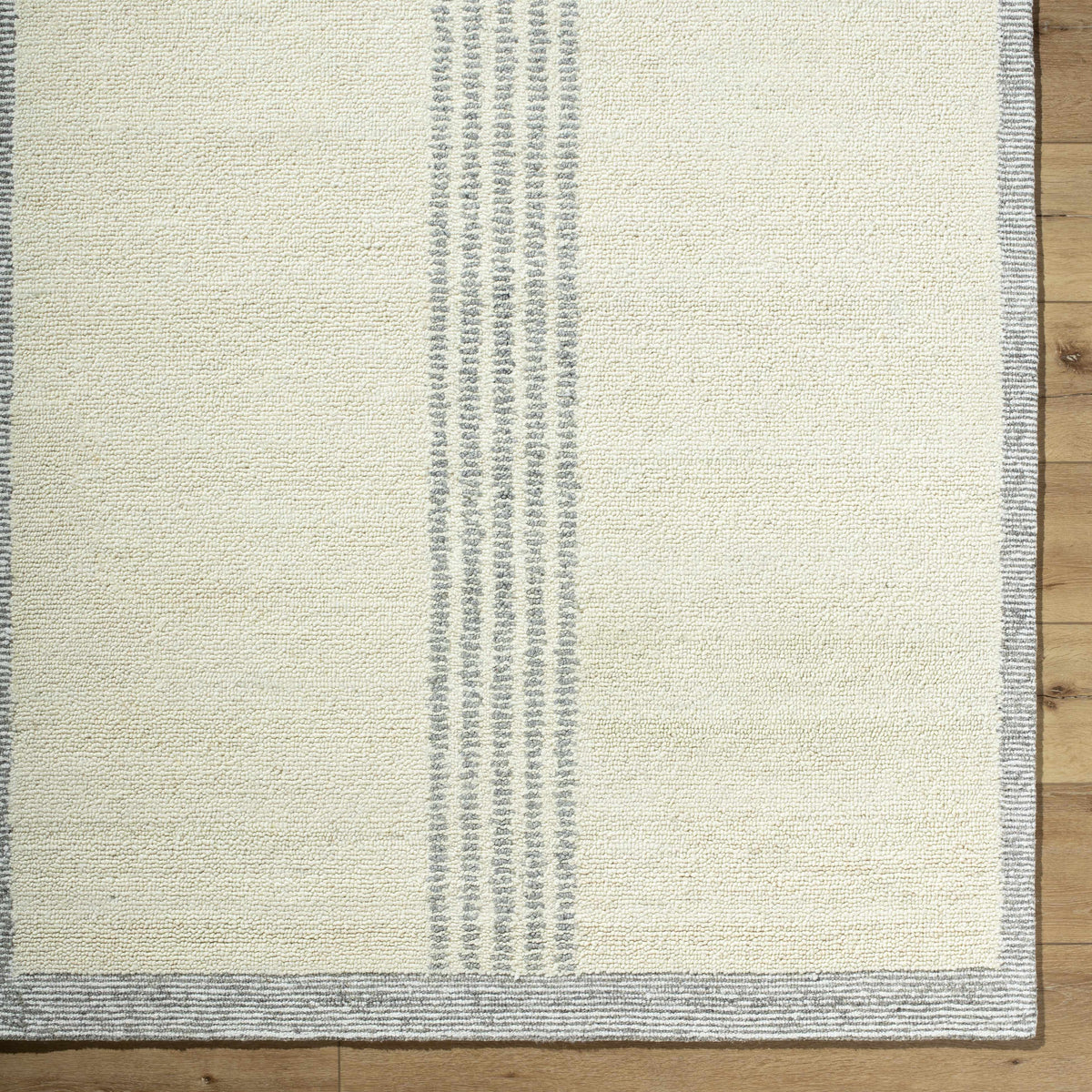 Ande Cream Area Rug by Boutique Rugs, cream textured pile with gray stripes on Tampa Home & Garden Store