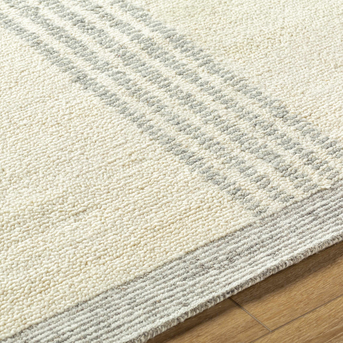 Ande Cream Area Rug by Boutique Rugs, cream with gray speckled pattern, loop pile on Tampa Home & Garden Store