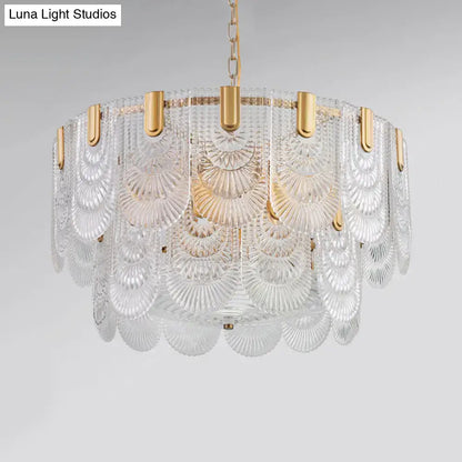 Textured Glass Brass Chandelier with gold hardware and cascading clear disc panels on Tampa Home & Garden Store