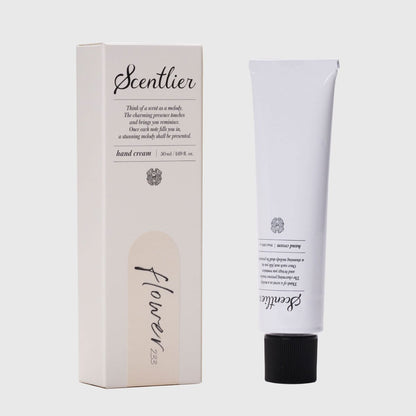 White hand cream tube and beige box for Scentlier Hand Cream 50ml by Seoulia, floral label on Tampa Home & Garden Store