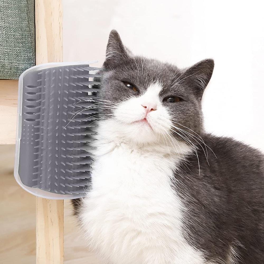 Self Groomer Cat Brush by Stevvex angle massager in gray plastic, cat rubbing its cheek on Tampa Home & Garden Store