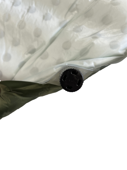 Self-Inflating Sleeping Pad valve close-up, River Country Gear, white dotted fabric on Tampa Home & Garden Store