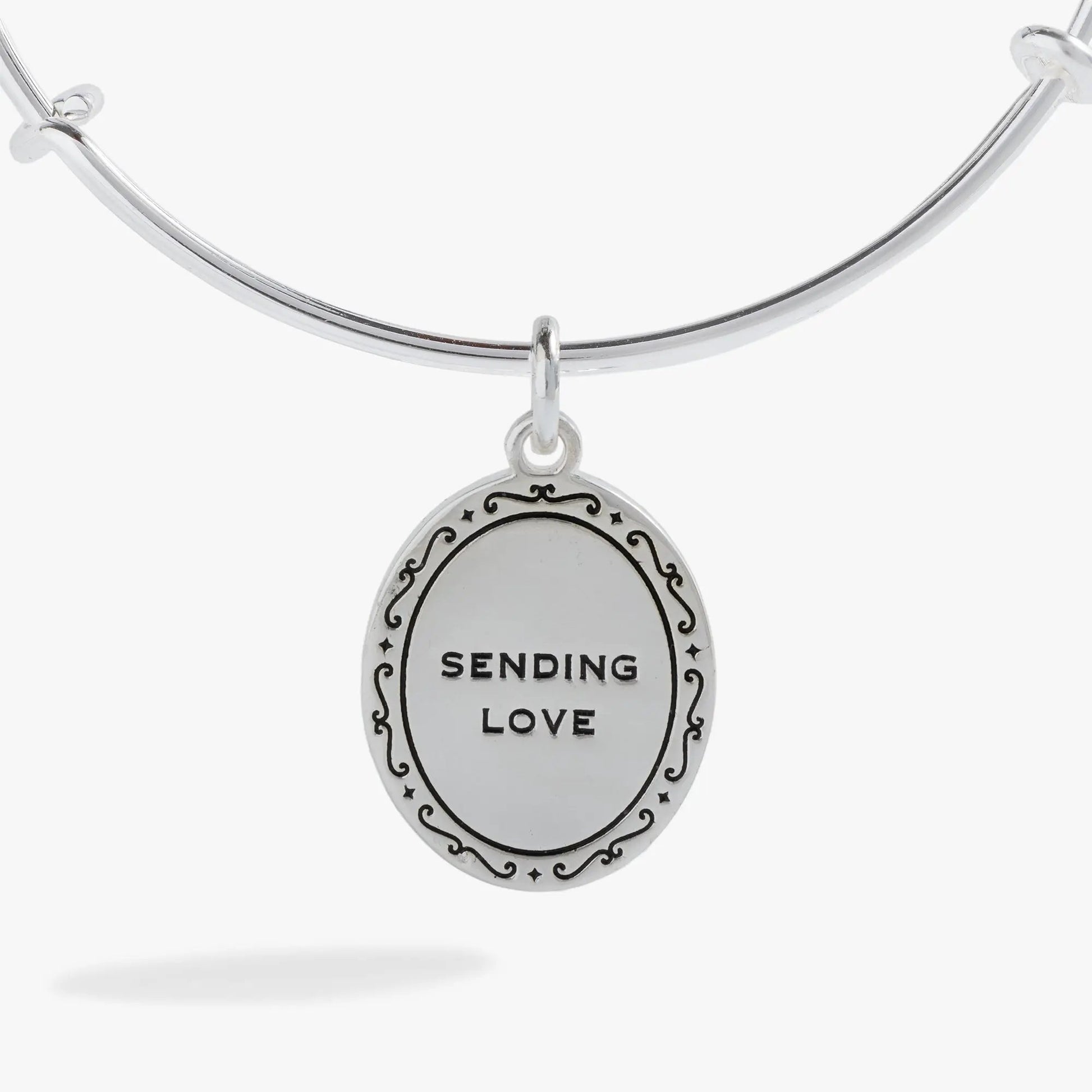Sending Love Charm Bangle silver-tone bracelet with oval pendant engraved SENDING LOVE on Tampa Home & Garden Store