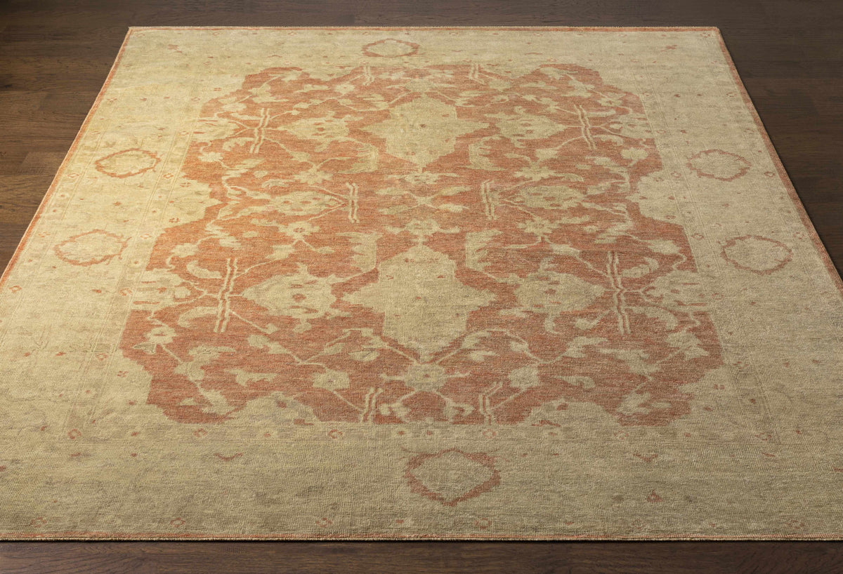 Seney Peach Area Rug beige field with peach distressed floral motif Boutique Rugs on Tampa Home & Garden Store