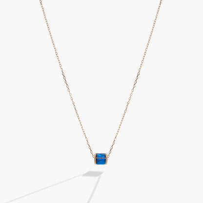 September Birthstone Pendant Necklace with blue stone in gold bezel on rose gold chain on Tampa Home & Garden Store